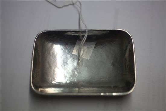 A 1930s Omar Ramsden small silver rounded rectangular dish, 64 grams.